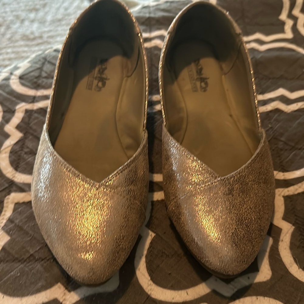 Coach and Four metallic silver slip ons size 6
